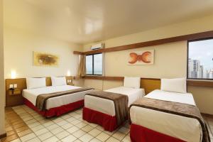 Una cama o camas en una habitación de Hotel Dan Inn Mar Piedade - Grande Recife By Nacional Inn 42 fotos más