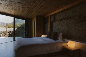 Postel nebo postele na pokoji v ubytování Canaryislandshost I Nativo