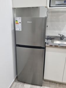 Køkken eller tekøkken på Mirasoles Suites