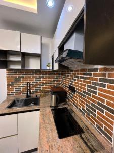 Кухня или мини-кухня в Luxury & Chic Apartment in Anthony, Maryland, Lagos, 7 mins from Ikeja Airport
 +1 фотография