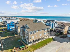 an aerial view of a house and the beach at Penthouse in Atlantic Beach