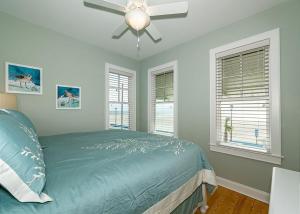 Postel nebo postele na pokoji v ubytování Captain's Choice