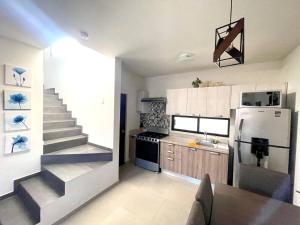 Kuchyň nebo kuchyňský kout v ubytování Oasis del Desierto