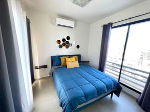 Postel nebo postele na pokoji v ubytování Oasis del Desierto