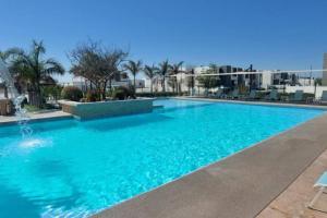 Bazén v ubytování Oasis del Desierto nebo v jeho okolí