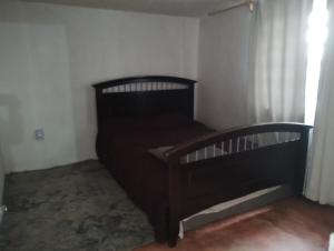 En eller flere senge i et værelse på Casa Nostalgia Tree, Patio and Vintage Touch