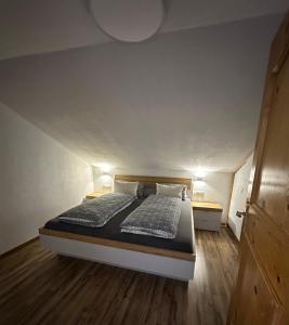 Ένα ή περισσότερα κρεβάτια σε δωμάτιο στο Apart Neunerhof