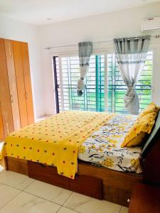 Ένα ή περισσότερα κρεβάτια σε δωμάτιο στο Residence Mofat