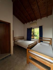 Postel nebo postele na pokoji v ubytování Hospedaje la Glorieta + 10 fotografií