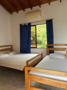 Postel nebo postele na pokoji v ubytování Hospedaje la Glorieta