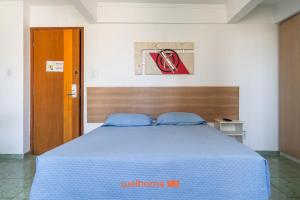 Postel nebo postele na pokoji v ubytování Apartamento em Macae a 500m da Praia de Imbetiba + 4 fotografie