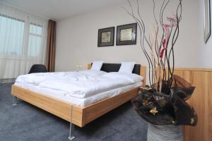 Postel nebo postele na pokoji v ubytování Pension Milk Inn + 18 fotografií