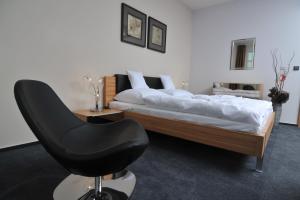 Postel nebo postele na pokoji v ubytování Pension Milk Inn