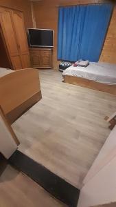 TV a/nebo společenská místnost v ubytování Shambhala Holiday House