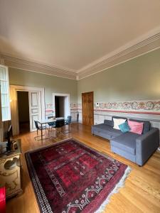 Гостиная зона в Puccini's Home, elegant apartment in Piazza Puccini