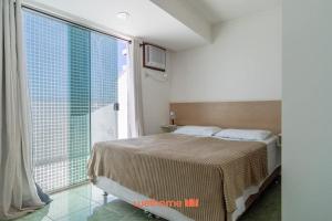 Postel nebo postele na pokoji v ubytování Apartamento em Macae Proximo a Praia de Imbetiba