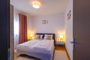 En eller flere senge i et værelse på Magic Pine