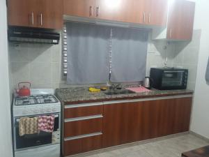 Køkken eller tekøkken på Piquillin San Lorenzo