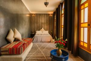 Postel nebo postele na pokoji v ubytování Riad 111 & Spa + 63 fotografií