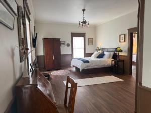 Postel nebo postele na pokoji v ubytování Hotel Ivanhoe