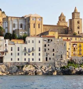 a view of a city from the water at Palazzo Cettina Sul Mare in Cefalù