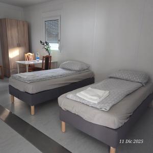 Ένα ή περισσότερα κρεβάτια σε δωμάτιο στο Motel Tiny House