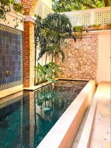 Bazén v ubytování Hotel Casa de la Acequia nebo v jeho okolí