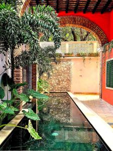 Bazén v ubytování Hotel Casa de la Acequia nebo v jeho okolí