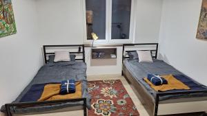 Postel nebo postele na pokoji v ubytování Play Apartments