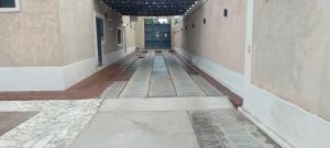 an empty hallway of a building with a door at El Aura l Complejo de apartamentos amoblados in Villa Krause +125 photos