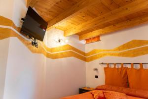 TV a/nebo společenská místnost v ubytování La Casa Del Grillo 2