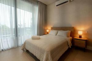 Postel nebo postele na pokoji v ubytování Hillside Oceanview Home with Pool in Venao