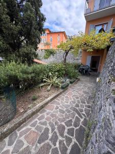 Κήπος έξω από το Torbole Lake View Retreat +3 φωτογραφίες