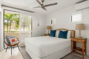 Ένα ή περισσότερα κρεβάτια σε δωμάτιο στο Postcard on Sunrise