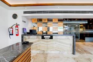 Ảnh trong thư viện ảnh của Palette by CheckIn River Front Railway Station Formerly Host Inn ở Ahmedabad