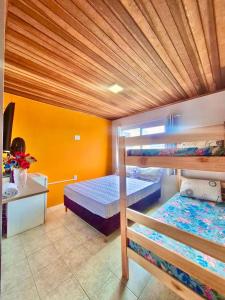 Ένα ή περισσότερα κρεβάτια σε δωμάτιο στο #MaReSiaSdaPaz próximo ao centro de Matinhos