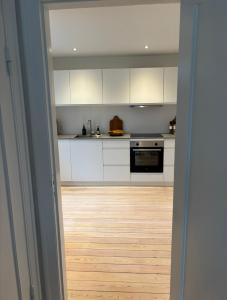 Kuchyň nebo kuchyňský kout v ubytování Unique Living - Herning City Central House + 19 fotografií