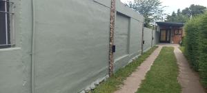 Bygningen som lejligheden ligger i + 3 billeder