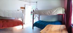 Postel nebo postele na pokoji v ubytování Camping Rio de las Vueltas