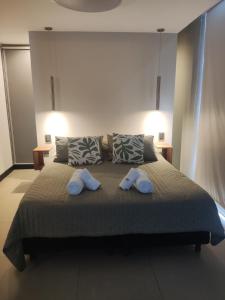 Postel nebo postele na pokoji v ubytování Comfort and Location