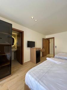 TV a/nebo společenská místnost v ubytování Pyramids hotel Merak + 95 fotografií