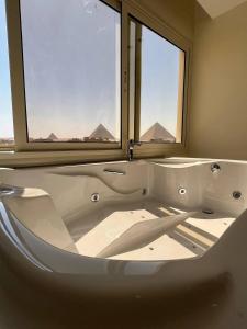 Fotografie z fotogalerie ubytování Pyramids hotel Merak v destinaci Banī Ghālib