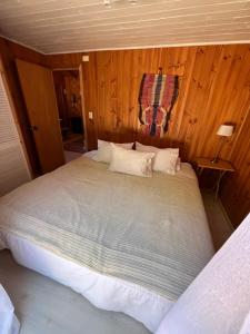 Postel nebo postele na pokoji v ubytování Cabaña Ilhabela