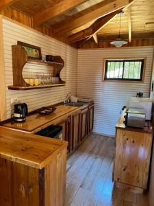 Kuchyň nebo kuchyňský kout v ubytování Cabaña Ilhabela