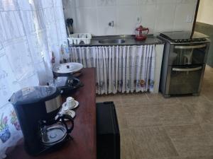 Kuchyň nebo kuchyňský kout v ubytování Espaço Verde Hospedagem + 9 fotografií