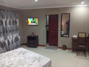 Et tv og/eller underholdning på Jomus Guest House