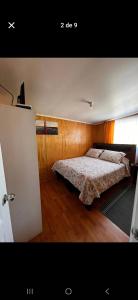 Кровать или кровати в номере Hospedaje Mary