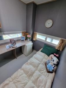 Postel nebo postele na pokoji v ubytování Halla Livingtel