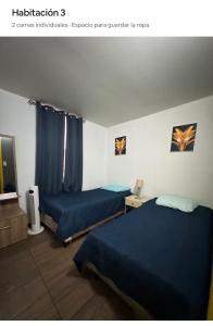 Giường trong phòng chung tại Loft Tegucigalpa