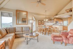 a living room with a couch and a table at River Ridge 421AB - Meredith Lodging in Bend
